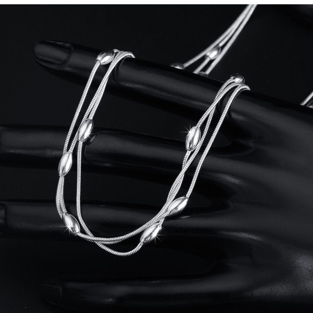 Ethereal Cascade Multi-Strand Necklace